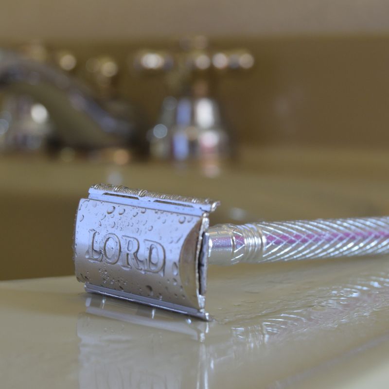 RVS safety razor met 10 mesjes